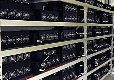 A bustling mining farm filled with rows of low-energy ASIC miners, showcasing the infrastructure for efficient crypto operations