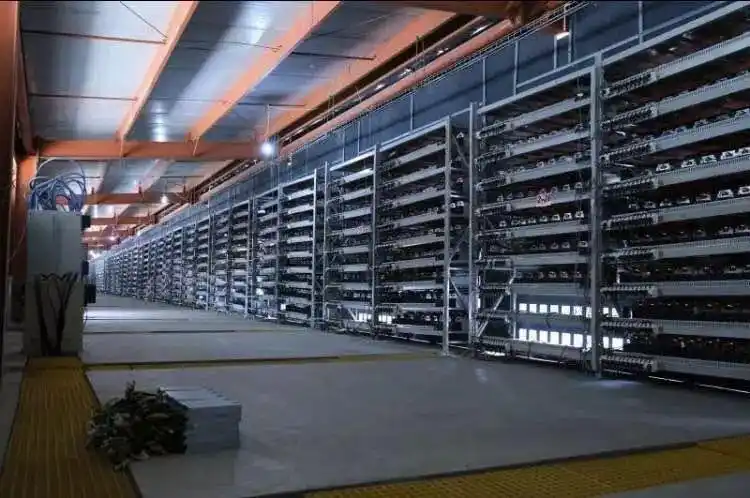 A panoramic view of a modern mining farm with rows of high-performance rigs