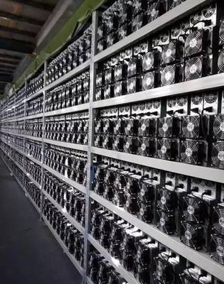 Vast cryptocurrency mining farm with rows of hosted mining equipment